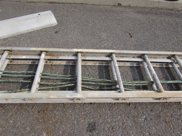 VERY LONG ALUMINUM EXTENSION LADDER