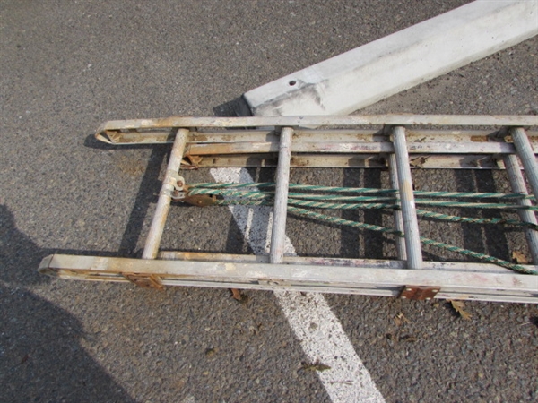 VERY LONG ALUMINUM EXTENSION LADDER