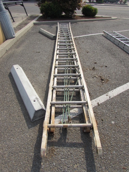 VERY LONG ALUMINUM EXTENSION LADDER
