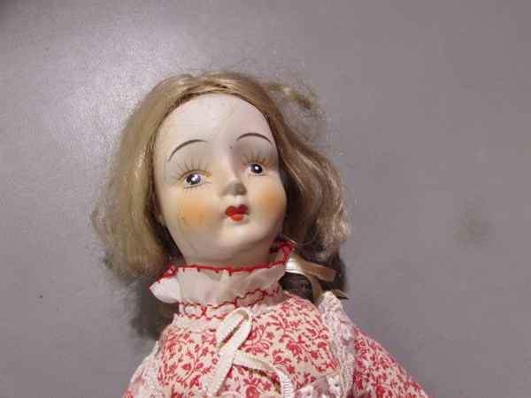 VINTAGE PORCELAIN DOLL