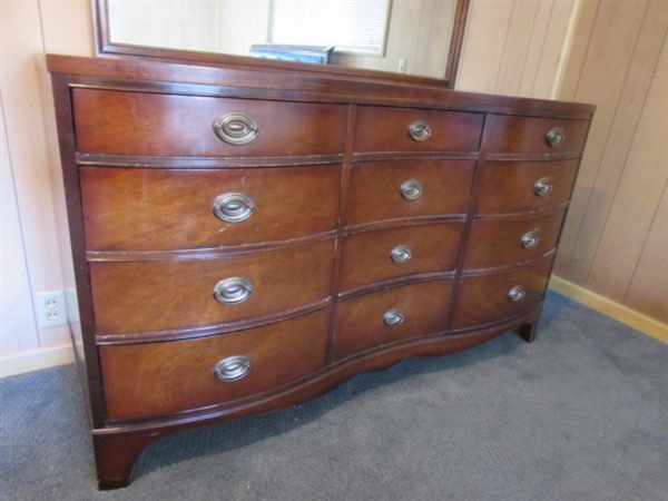 ANTIQUE MAHOGANY 12 DRAWER SERPENTINE DRESSER WITH ATTACHED MIRROR *LOCATED OFF-SITE #2*