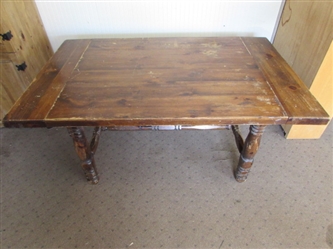 OLDER SOLID WOOD TABLE