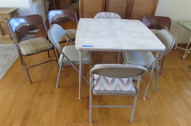VINYL TOP CARD TABLE & 8 FOLDING CHAIRS WITH PADDED SEATS