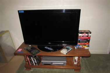 37" LG TV, HITACHI DVD/VHS PLAYER, MAPLE STAND, DVDS & VHS MOVIES