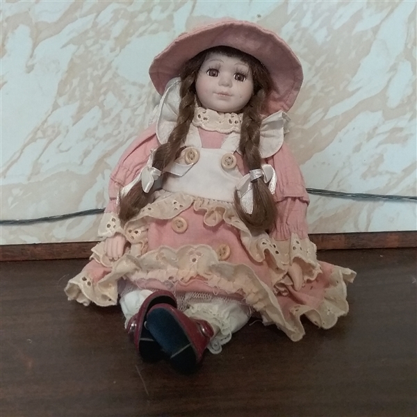 11 POSEABLE PORCELAIN DOLL