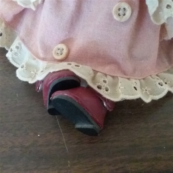 11 POSEABLE PORCELAIN DOLL