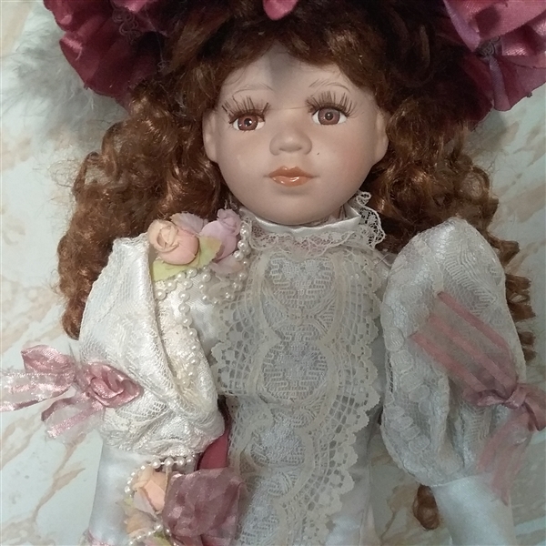 18 PORCELAIN DOLL