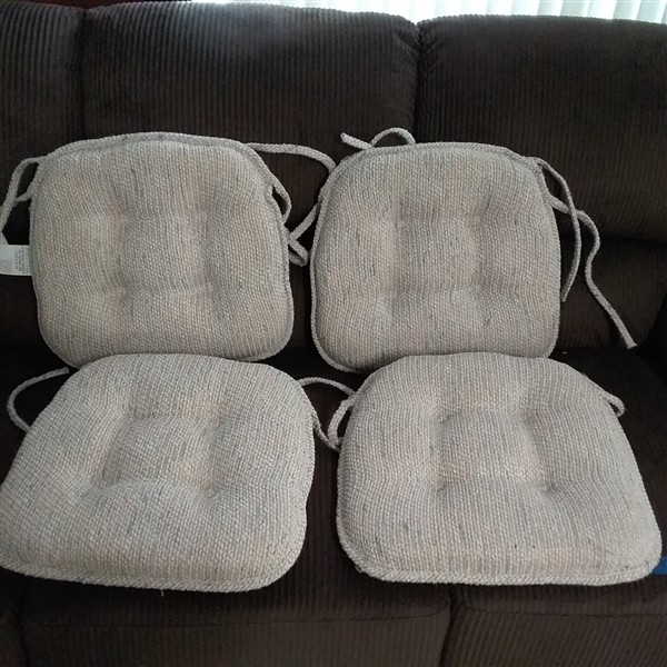 FOUR TUFTED CHAIR PADS