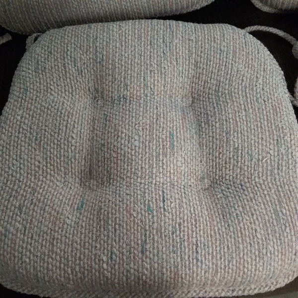 FOUR TUFTED CHAIR PADS