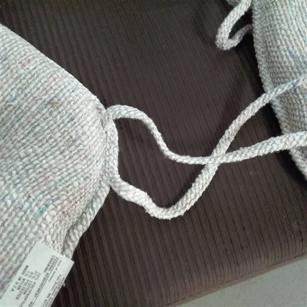 FOUR TUFTED CHAIR PADS