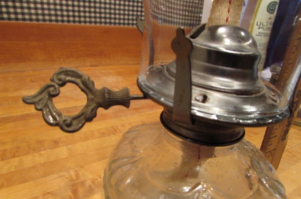 2 VINTAGE OIL LAMPS & BOTTLE OF LAMP OIL