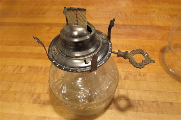 2 VINTAGE OIL LAMPS & BOTTLE OF LAMP OIL