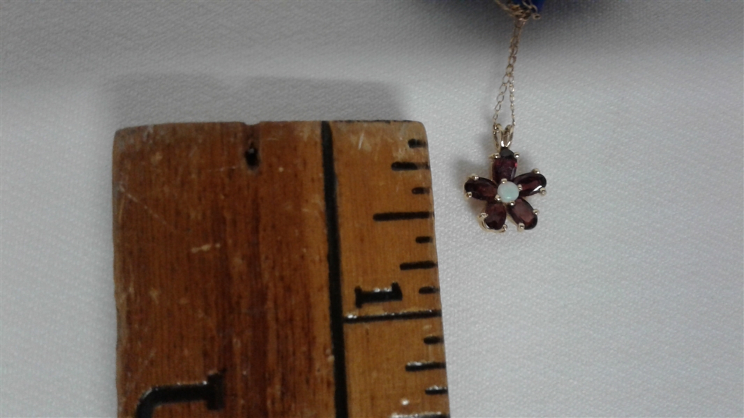 GOLD AND GARNET JEWELRY