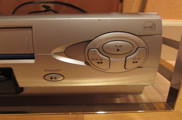 SMALL SIDE TABLE WITH DVD PLAYER/VCR/DVD'S & VHS MOVIES