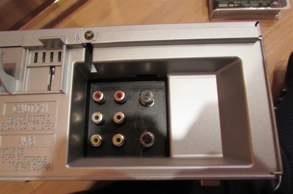 SMALL SIDE TABLE WITH DVD PLAYER/VCR/DVD'S & VHS MOVIES
