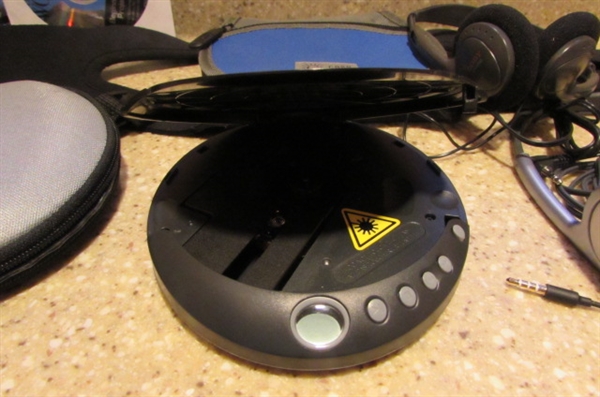 COBY DIGITAL CD PLAYER, CASE, HEADPHONES & CDS