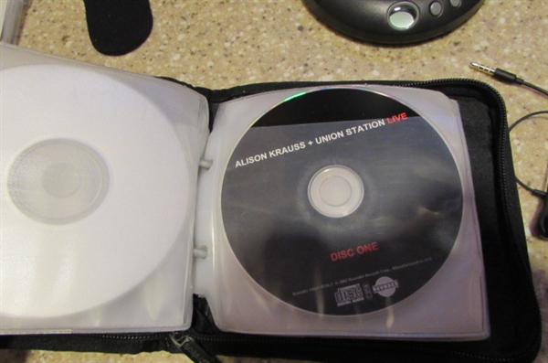 COBY DIGITAL CD PLAYER, CASE, HEADPHONES & CDS