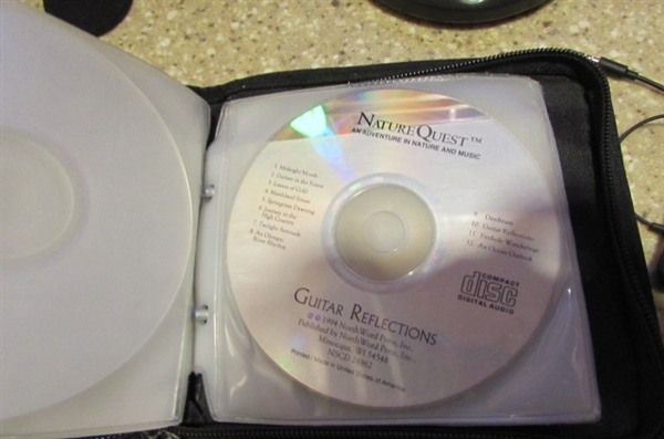 COBY DIGITAL CD PLAYER, CASE, HEADPHONES & CDS