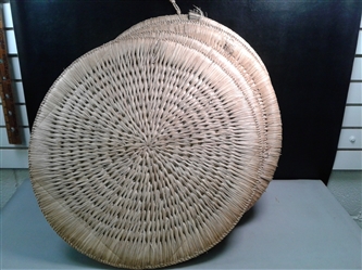 Five 22" Round Woven Mats With Hangers 