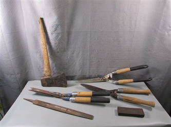 Hedge Shears, Axe, and other Tools. Axe handle needs to be replaced.