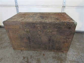 RUSTY, RUSTIC METAL OVER WOOD TRUNK