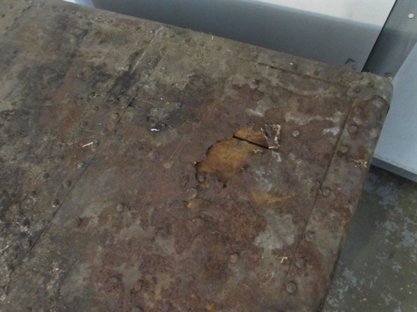 RUSTY, RUSTIC METAL OVER WOOD TRUNK