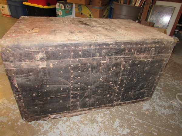 RUSTY, RUSTIC METAL OVER WOOD TRUNK