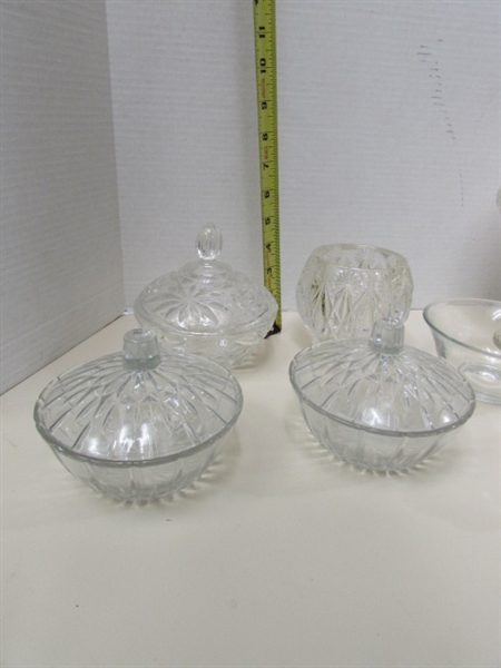 ASSORTED VINTAGE PRESSED GLASS LIDDED CANDY DISHES & CANDLE HOLDERS