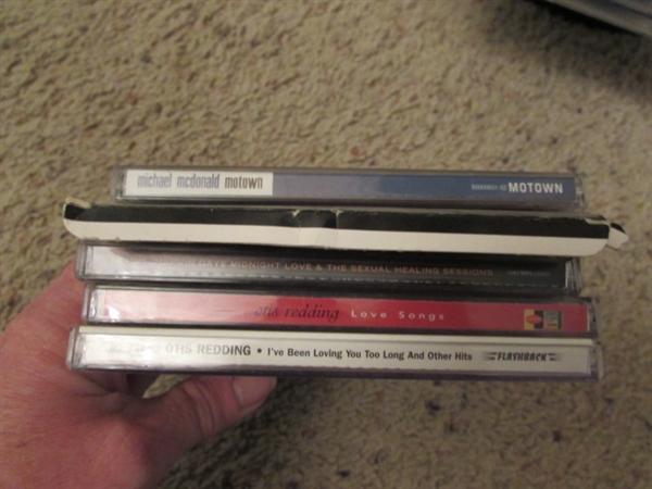 LARGE ASSORTMENT OF CDS ON STAND & EXTRA CASES