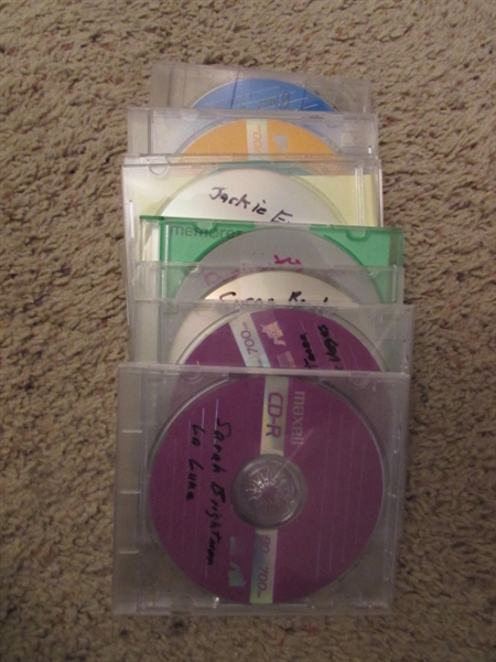 LARGE ASSORTMENT OF CDS ON STAND & EXTRA CASES