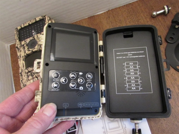 PAIR OF TRAIL CAMERAS, BOTH WORK & COME W/MEMORY CARDS & ADAPTER