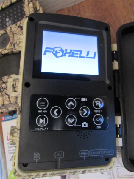 PAIR OF TRAIL CAMERAS, BOTH WORK & COME W/MEMORY CARDS & ADAPTER