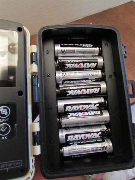 PAIR OF TRAIL CAMERAS, BOTH WORK & COME W/MEMORY CARDS & ADAPTER