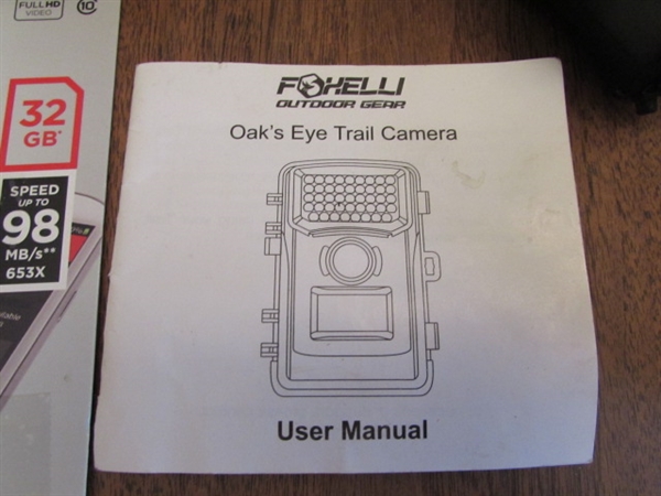 PAIR OF TRAIL CAMERAS, BOTH WORK & COME W/MEMORY CARDS & ADAPTER