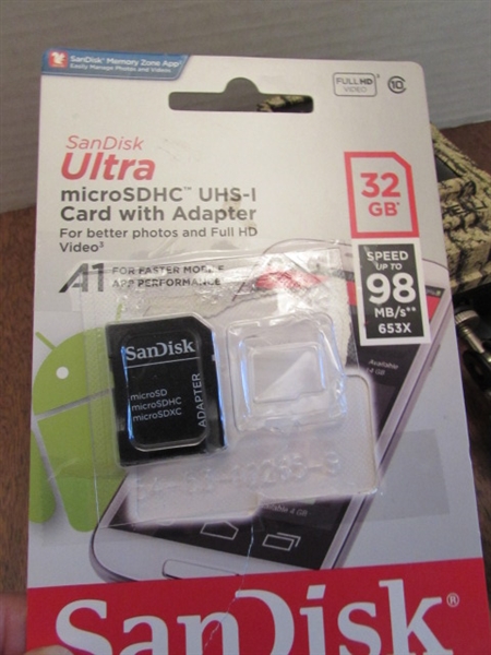 PAIR OF TRAIL CAMERAS, BOTH WORK & COME W/MEMORY CARDS & ADAPTER