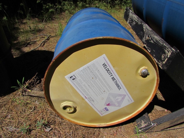 4 55-GALLON DRUMS (EMPTY) & 1 STAND