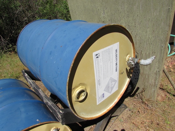 4 55-GALLON DRUMS (EMPTY) & 1 STAND