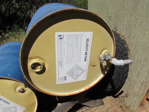 4 55-GALLON DRUMS (EMPTY) & 1 STAND
