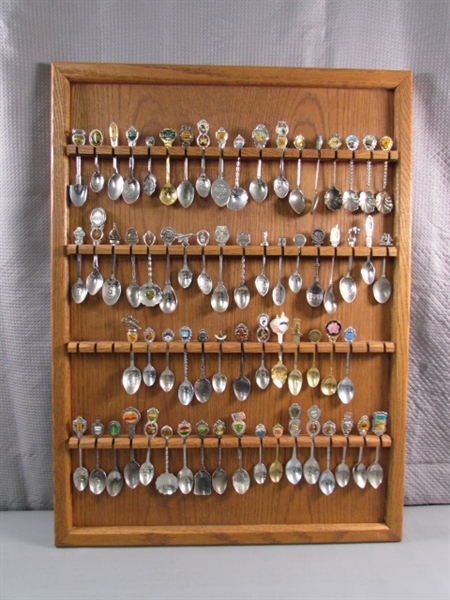 LARGE SOUVENIR SPOON COLLECTION ON DISPLAY BOARD