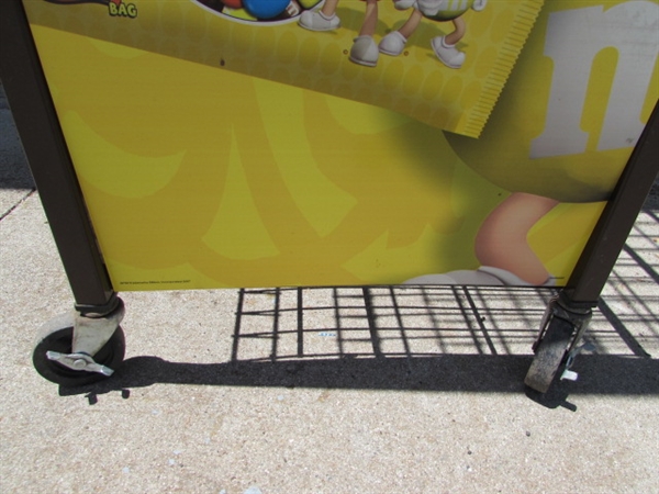 METAL M&M STORE DISPLAY RACK ON WHEELS