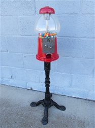GUMBALL MACHINE ON CAST IRON STAND