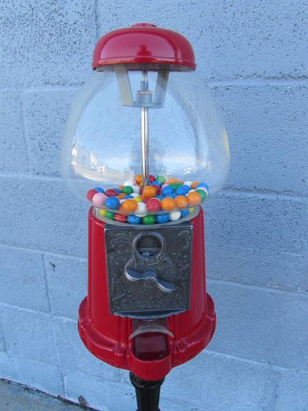 GUMBALL MACHINE ON CAST IRON STAND