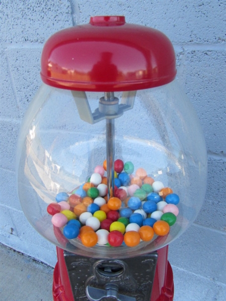 GUMBALL MACHINE ON CAST IRON STAND