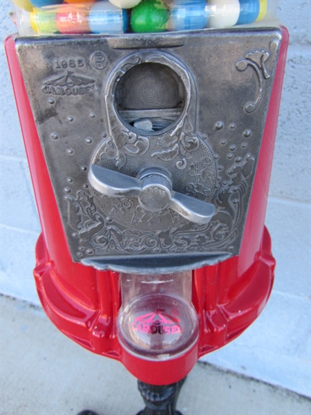 GUMBALL MACHINE ON CAST IRON STAND