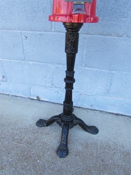 GUMBALL MACHINE ON CAST IRON STAND