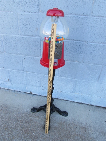 GUMBALL MACHINE ON CAST IRON STAND
