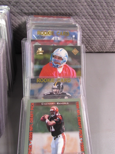 COLLECTION OF FOOTBALL TRADING CARDS IN HARD COVERS