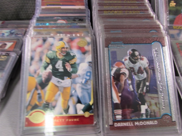 COLLECTION OF FOOTBALL TRADING CARDS IN HARD COVERS
