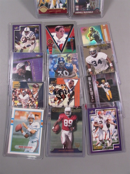 COLLECTION OF FOOTBALL TRADING CARDS IN HARD COVERS