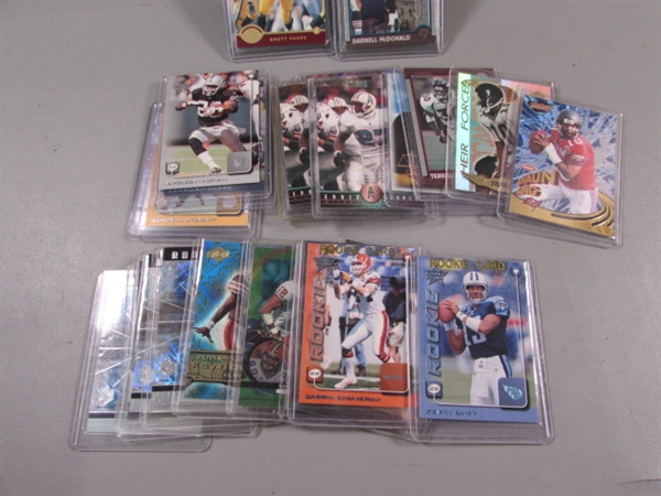 COLLECTION OF FOOTBALL TRADING CARDS IN HARD COVERS